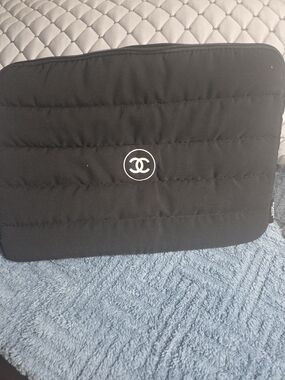 CHANEL Black Quilted Neoprene Sleeve with White CC Emblem